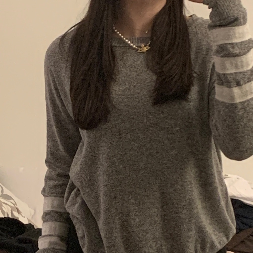 gray long sleeve sweater with white stripes